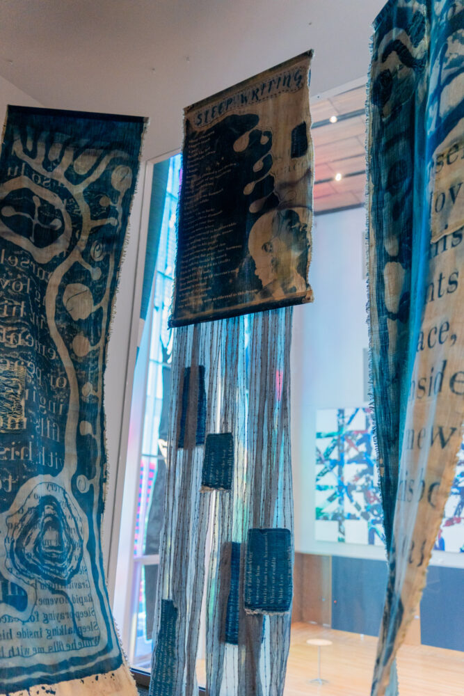 Fiber work with poetry print