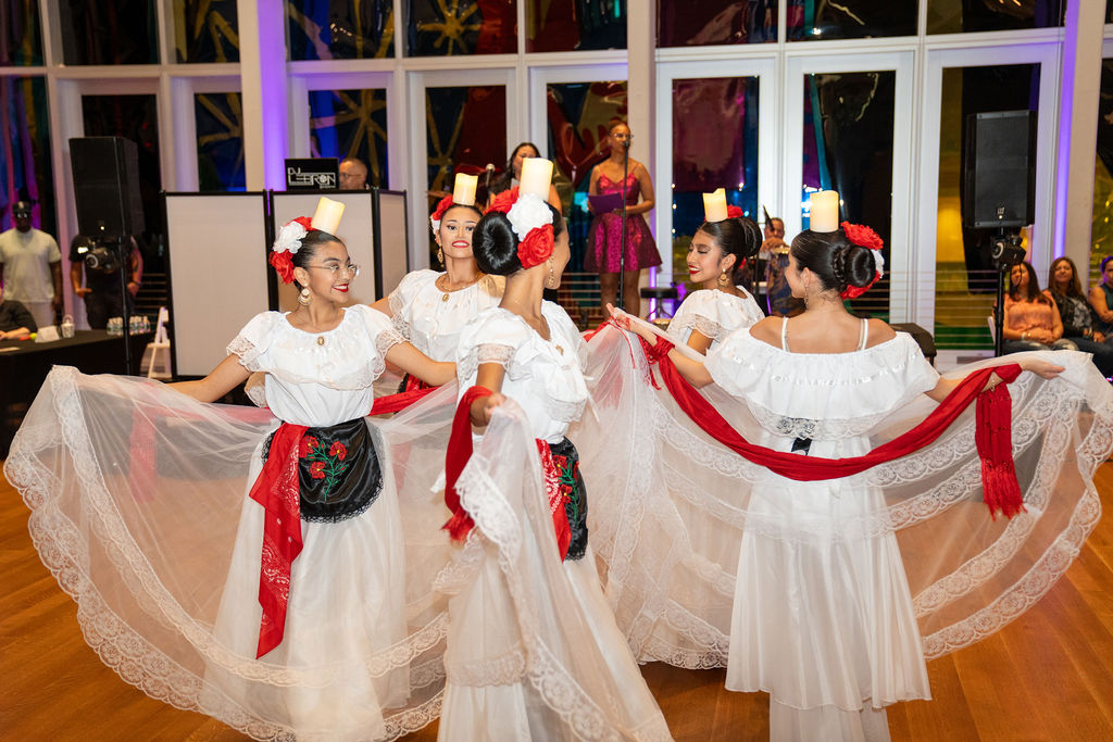 Group of dancers with candles performing at Mint 2 Move